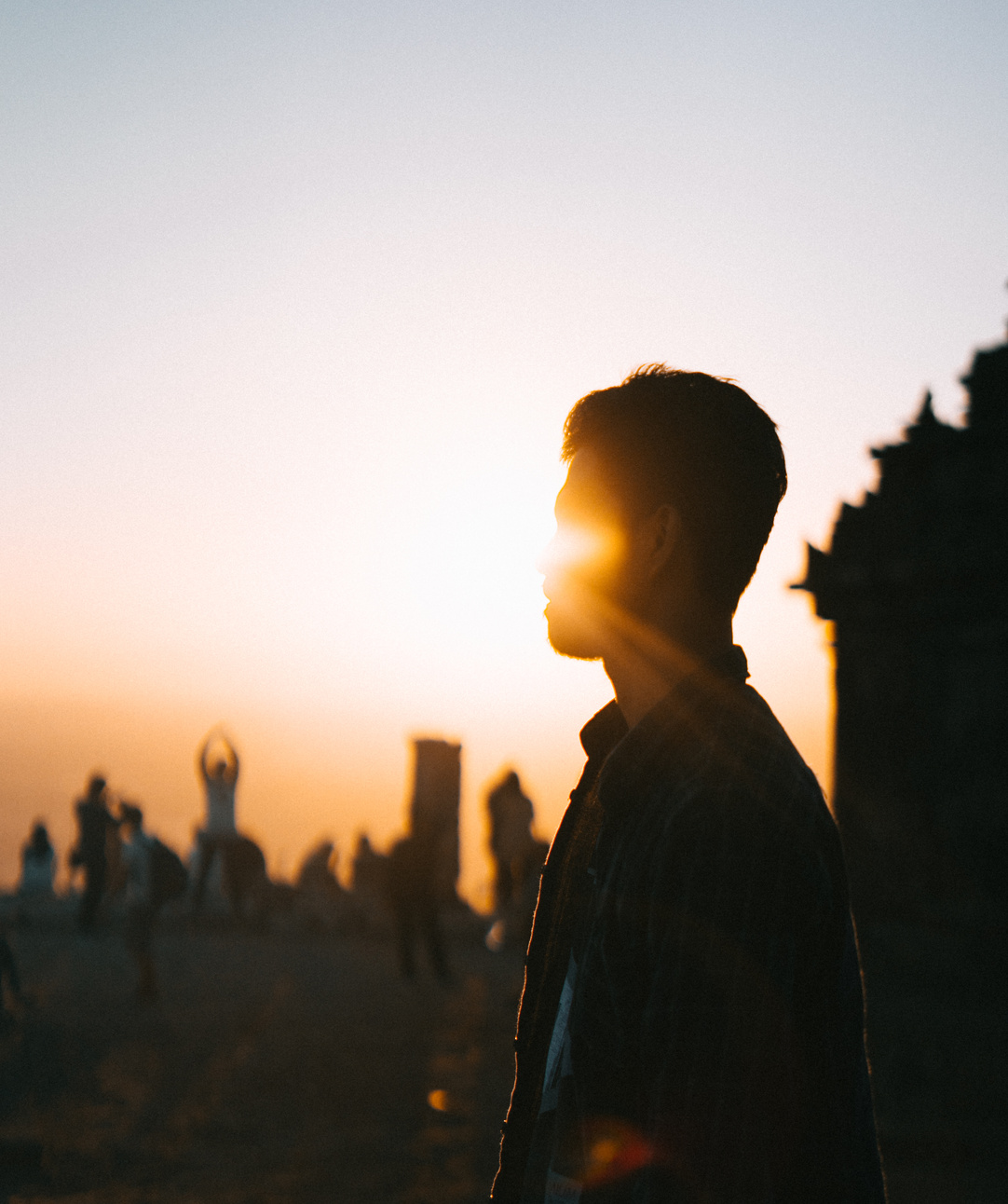 Man Standing Near People